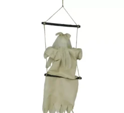 Bambina appesa su altalena da 75 cm con luci e suoni