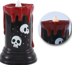 Candela a forma di teschio con luce e musica