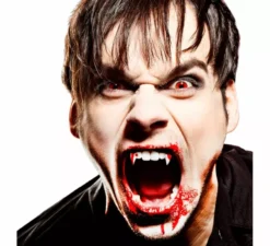 Dentiera da vampiro con 4 capsule di sangue