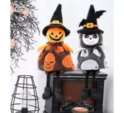 Ornamento da 20 cm a forma di zucca e bambola da incubo. Modelli assortiti.