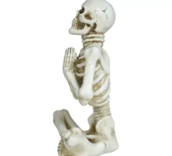 Scheletro seduto 19x14 cm